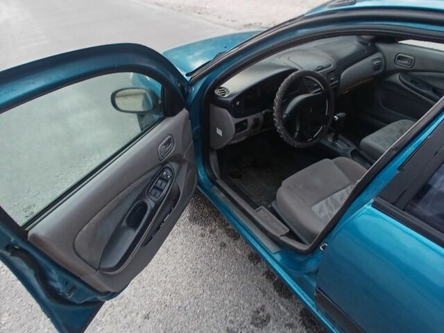 Синий Ниссан Альмера, объемом двигателя 1.6 л и пробегом 241 тыс. км за 3000 $, фото 6 на Automoto.ua