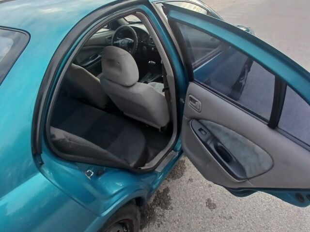 Синий Ниссан Альмера, объемом двигателя 1.6 л и пробегом 241 тыс. км за 3000 $, фото 8 на Automoto.ua