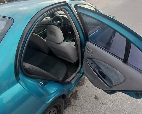 Синій Ніссан Альмера, об'ємом двигуна 1.6 л та пробігом 241 тис. км за 3000 $, фото 2 на Automoto.ua