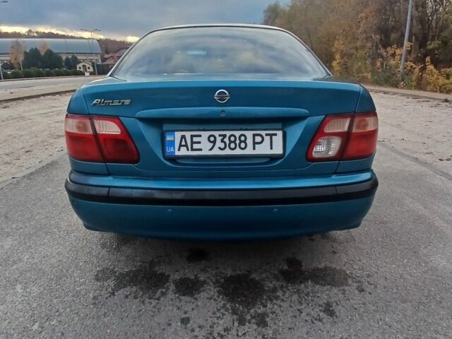 Синий Ниссан Альмера, объемом двигателя 1.6 л и пробегом 241 тыс. км за 3000 $, фото 2 на Automoto.ua