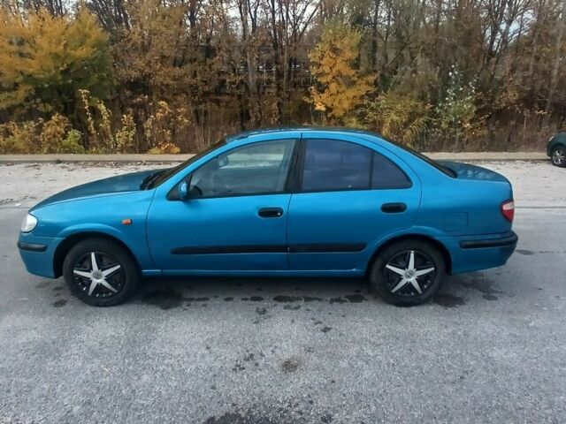 Синий Ниссан Альмера, объемом двигателя 1.6 л и пробегом 241 тыс. км за 3000 $, фото 4 на Automoto.ua