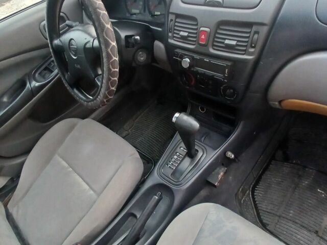 Синий Ниссан Альмера, объемом двигателя 1.6 л и пробегом 241 тыс. км за 3000 $, фото 11 на Automoto.ua