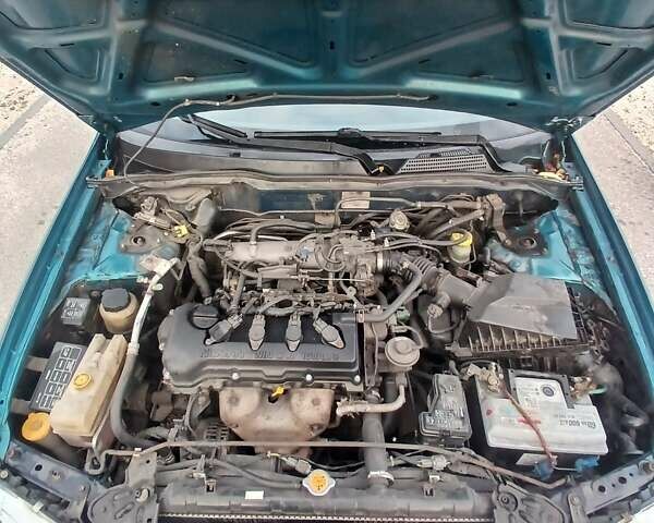 Синій Ніссан Альмера, об'ємом двигуна 1.6 л та пробігом 241 тис. км за 3000 $, фото 10 на Automoto.ua