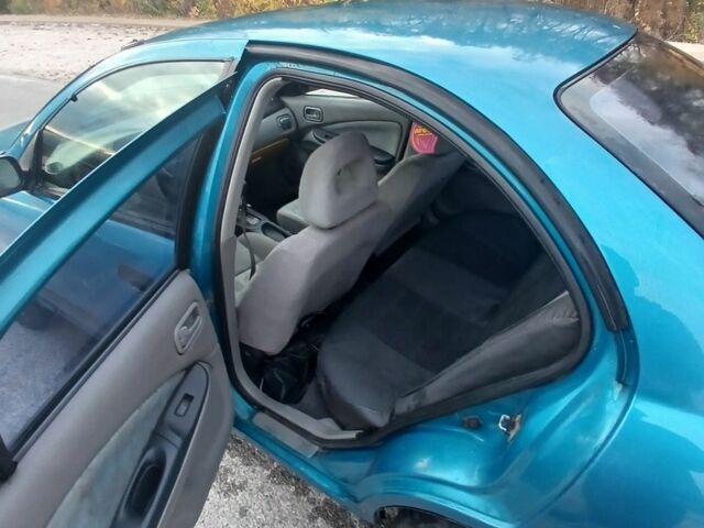 Синий Ниссан Альмера, объемом двигателя 1.6 л и пробегом 241 тыс. км за 3000 $, фото 5 на Automoto.ua