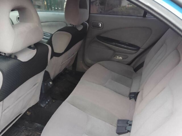 Синій Ніссан Альмера, об'ємом двигуна 1.4 л та пробігом 158 тис. км за 3500 $, фото 10 на Automoto.ua