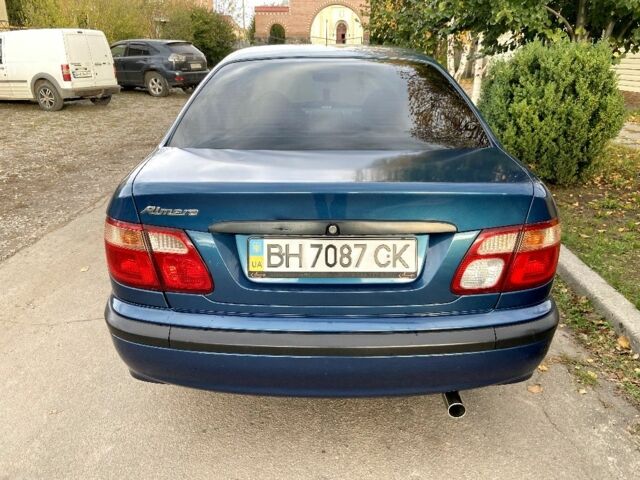 Синій Ніссан Альмера, об'ємом двигуна 1 л та пробігом 124 тис. км за 4250 $, фото 8 на Automoto.ua