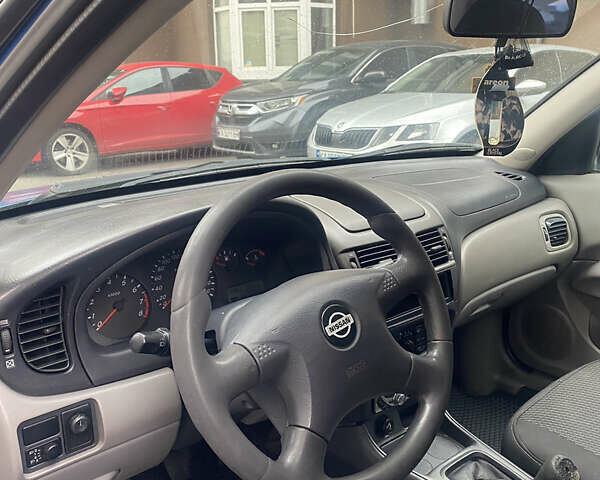 Синій Ніссан Альмера, об'ємом двигуна 1.5 л та пробігом 217 тис. км за 2299 $, фото 4 на Automoto.ua