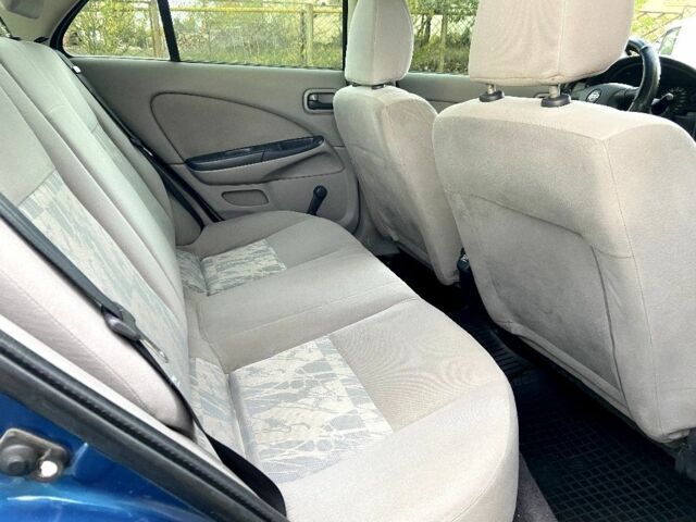 Синій Ніссан Альмера, об'ємом двигуна 1 л та пробігом 124 тис. км за 4250 $, фото 7 на Automoto.ua