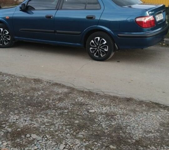 Синій Ніссан Альмера, об'ємом двигуна 1 л та пробігом 124 тис. км за 4250 $, фото 1 на Automoto.ua