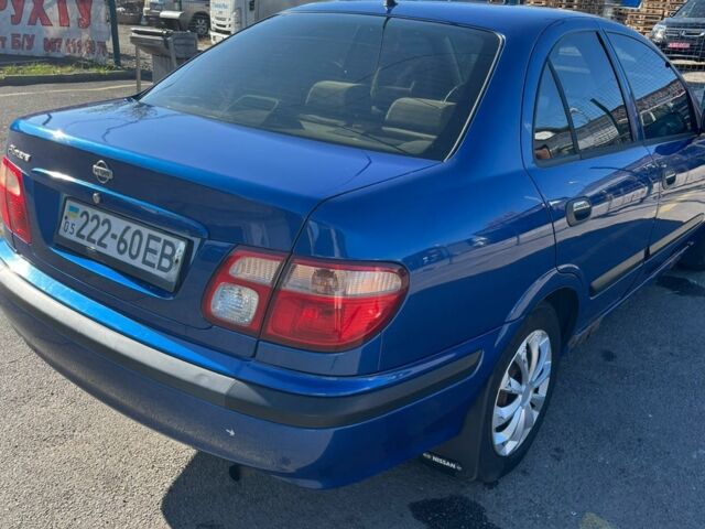 Синий Ниссан Альмера, объемом двигателя 1.5 л и пробегом 319 тыс. км за 2000 $, фото 3 на Automoto.ua