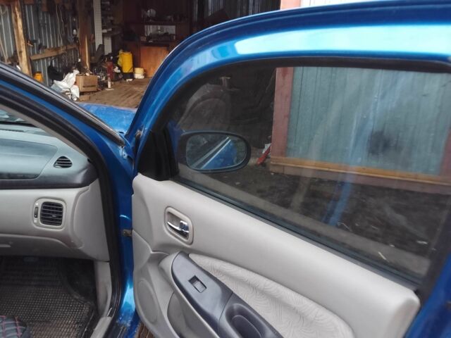 Синій Ніссан Альмера, об'ємом двигуна 1.4 л та пробігом 158 тис. км за 3500 $, фото 8 на Automoto.ua