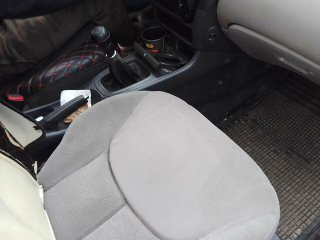 Синій Ніссан Альмера, об'ємом двигуна 1.4 л та пробігом 158 тис. км за 3500 $, фото 7 на Automoto.ua