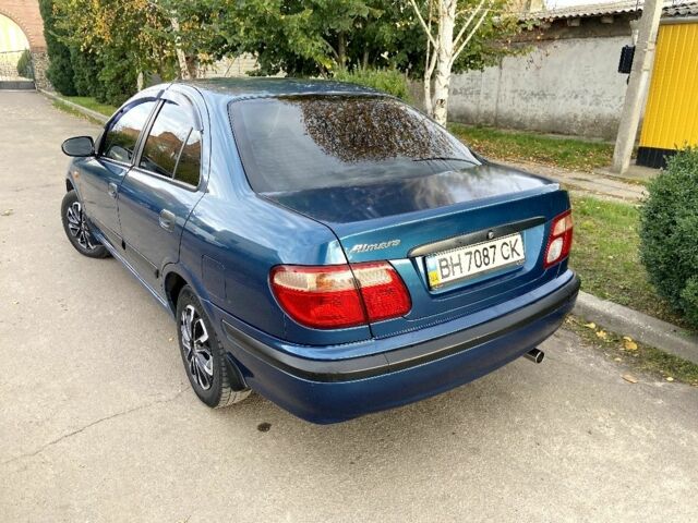 Синій Ніссан Альмера, об'ємом двигуна 1 л та пробігом 124 тис. км за 4250 $, фото 10 на Automoto.ua