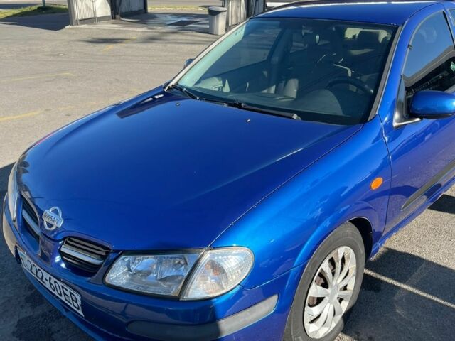 Синий Ниссан Альмера, объемом двигателя 1.5 л и пробегом 319 тыс. км за 2000 $, фото 6 на Automoto.ua