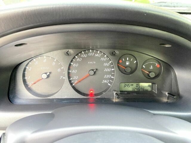 Синій Ніссан Альмера, об'ємом двигуна 1 л та пробігом 124 тис. км за 4250 $, фото 16 на Automoto.ua