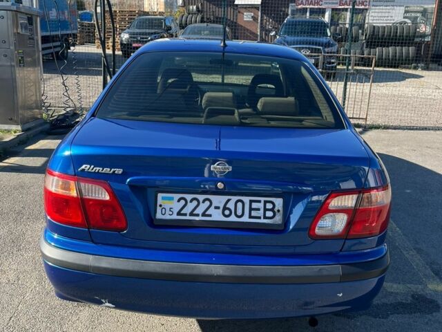 Синий Ниссан Альмера, объемом двигателя 1.5 л и пробегом 319 тыс. км за 2000 $, фото 4 на Automoto.ua