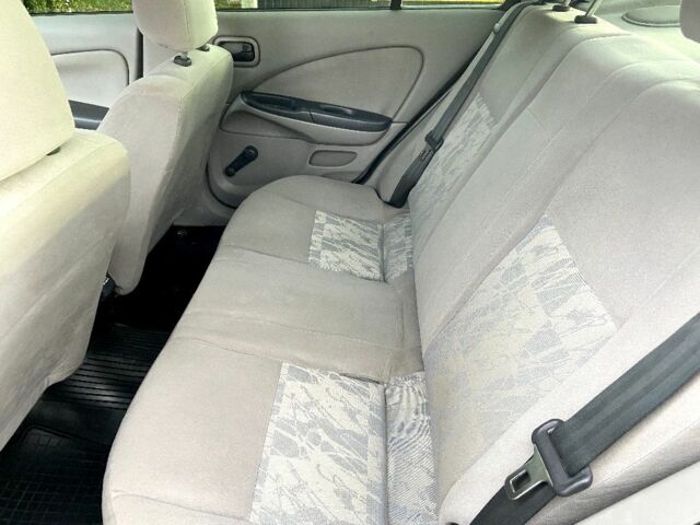 Синій Ніссан Альмера, об'ємом двигуна 1 л та пробігом 124 тис. км за 4250 $, фото 18 на Automoto.ua