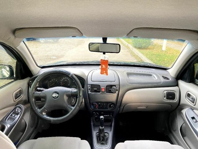 Синій Ніссан Альмера, об'ємом двигуна 1 л та пробігом 124 тис. км за 4250 $, фото 6 на Automoto.ua