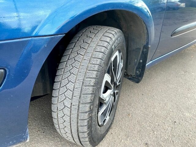 Синій Ніссан Альмера, об'ємом двигуна 1 л та пробігом 124 тис. км за 4250 $, фото 2 на Automoto.ua