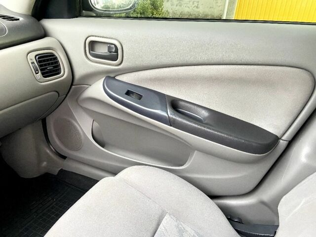 Синій Ніссан Альмера, об'ємом двигуна 1 л та пробігом 124 тис. км за 4250 $, фото 12 на Automoto.ua