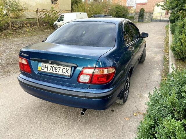 Синій Ніссан Альмера, об'ємом двигуна 1 л та пробігом 124 тис. км за 4250 $, фото 9 на Automoto.ua