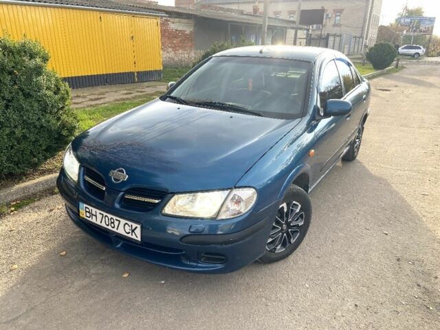 Синій Ніссан Альмера, об'ємом двигуна 1 л та пробігом 124 тис. км за 4250 $, фото 3 на Automoto.ua