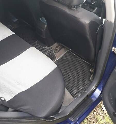 Синий Ниссан Альмера, объемом двигателя 1.5 л и пробегом 319 тыс. км за 3500 $, фото 13 на Automoto.ua