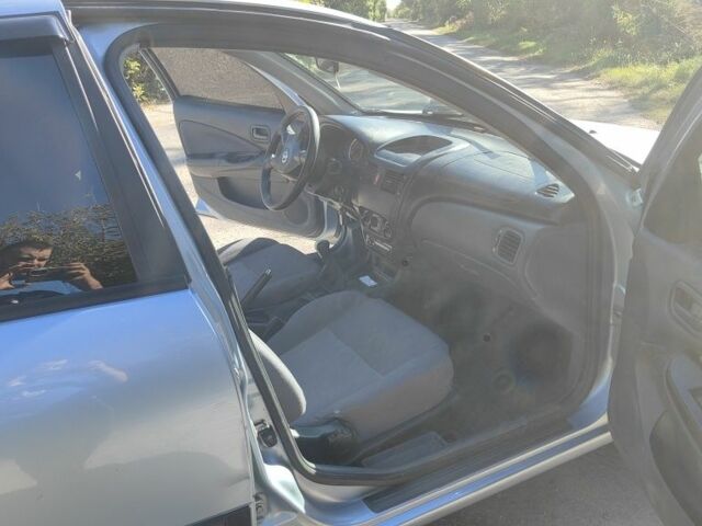 Синий Ниссан Альмера, объемом двигателя 1.5 л и пробегом 999 тыс. км за 3900 $, фото 6 на Automoto.ua