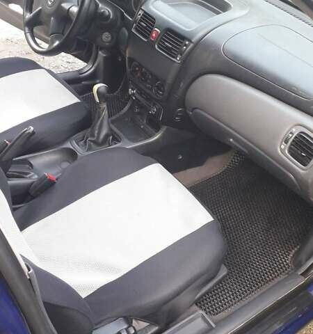 Синий Ниссан Альмера, объемом двигателя 1.5 л и пробегом 319 тыс. км за 3500 $, фото 14 на Automoto.ua