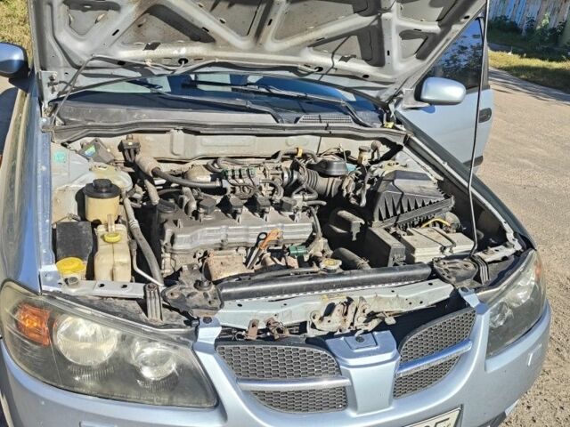 Синий Ниссан Альмера, объемом двигателя 1.5 л и пробегом 999 тыс. км за 3900 $, фото 10 на Automoto.ua