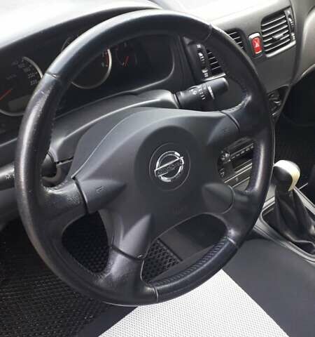 Синий Ниссан Альмера, объемом двигателя 1.5 л и пробегом 319 тыс. км за 3500 $, фото 12 на Automoto.ua