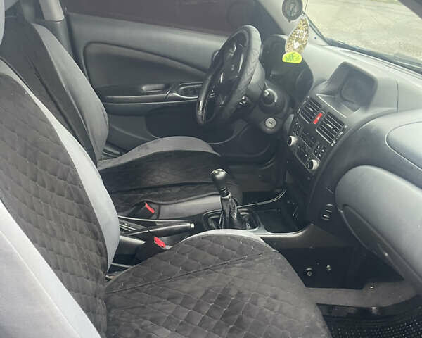 Синий Ниссан Альмера, объемом двигателя 1.5 л и пробегом 220 тыс. км за 2550 $, фото 7 на Automoto.ua