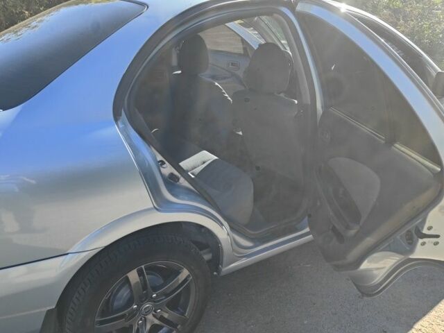 Синий Ниссан Альмера, объемом двигателя 1.5 л и пробегом 999 тыс. км за 3900 $, фото 7 на Automoto.ua