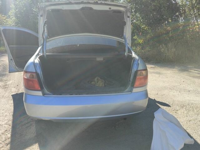 Синий Ниссан Альмера, объемом двигателя 1.5 л и пробегом 999 тыс. км за 3900 $, фото 11 на Automoto.ua