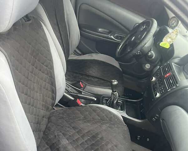 Синий Ниссан Альмера, объемом двигателя 1.5 л и пробегом 220 тыс. км за 2550 $, фото 6 на Automoto.ua