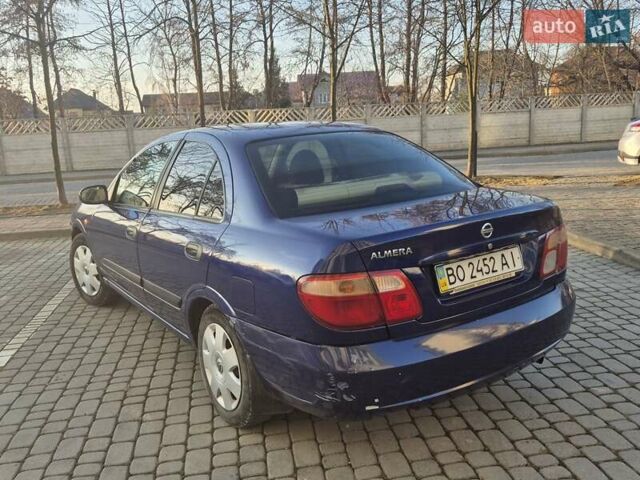 Синий Ниссан Альмера, объемом двигателя 1.5 л и пробегом 319 тыс. км за 3500 $, фото 5 на Automoto.ua