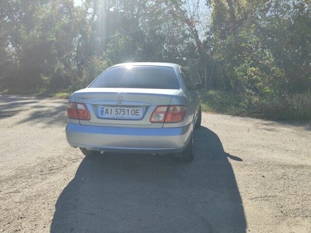 Синий Ниссан Альмера, объемом двигателя 1.5 л и пробегом 999 тыс. км за 3900 $, фото 2 на Automoto.ua