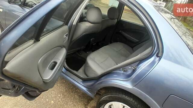 Синий Ниссан Альмера, объемом двигателя 1.6 л и пробегом 280 тыс. км за 3400 $, фото 14 на Automoto.ua