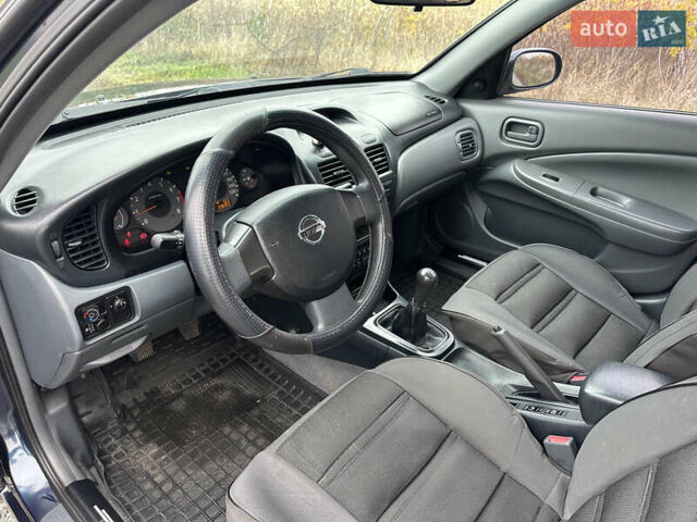 Синий Ниссан Альмера, объемом двигателя 1.6 л и пробегом 236 тыс. км за 5000 $, фото 16 на Automoto.ua