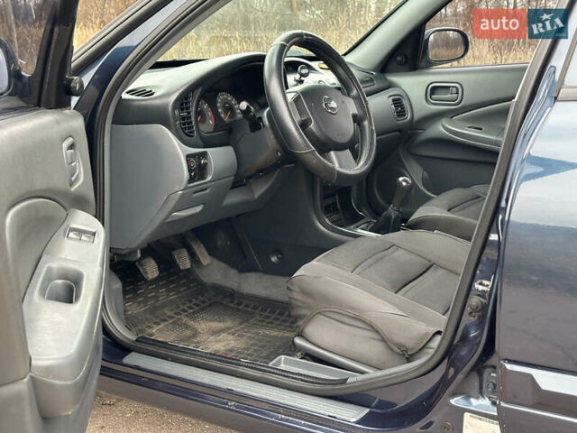 Синий Ниссан Альмера, объемом двигателя 1.6 л и пробегом 236 тыс. км за 4900 $, фото 15 на Automoto.ua