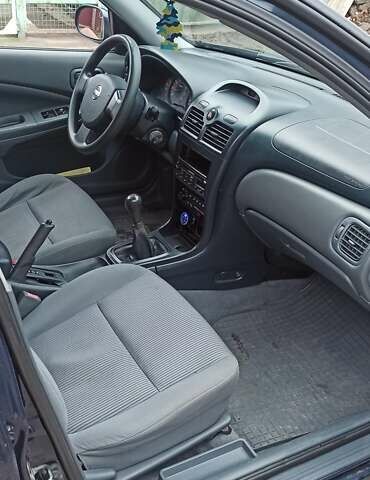 Синий Ниссан Альмера, объемом двигателя 1.6 л и пробегом 213 тыс. км за 4200 $, фото 6 на Automoto.ua