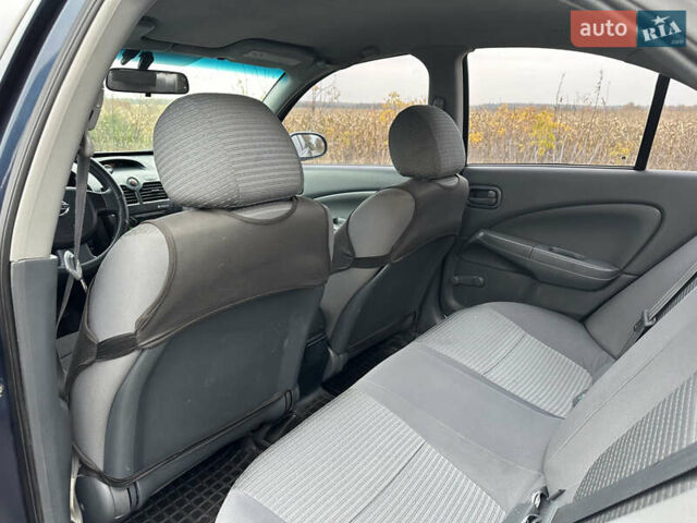 Синий Ниссан Альмера, объемом двигателя 1.6 л и пробегом 236 тыс. км за 5000 $, фото 20 на Automoto.ua