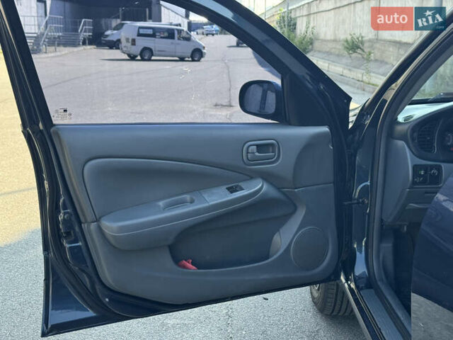 Синий Ниссан Альмера, объемом двигателя 1.6 л и пробегом 223 тыс. км за 3899 $, фото 6 на Automoto.ua