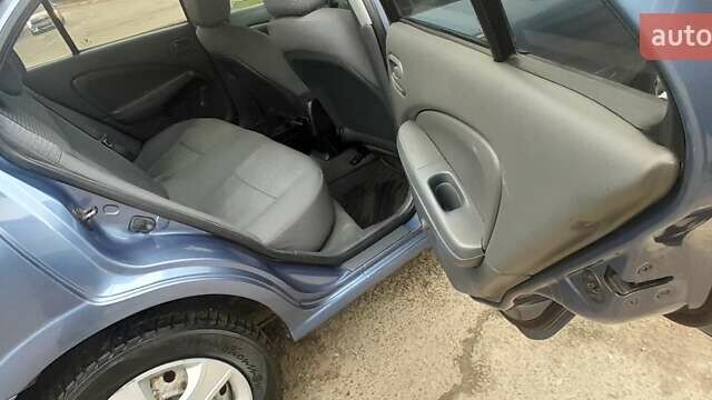 Синий Ниссан Альмера, объемом двигателя 1.6 л и пробегом 280 тыс. км за 3400 $, фото 12 на Automoto.ua
