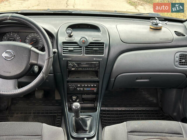 Синий Ниссан Альмера, объемом двигателя 1.6 л и пробегом 236 тыс. км за 4900 $, фото 20 на Automoto.ua