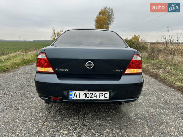 Синий Ниссан Альмера, объемом двигателя 1.6 л и пробегом 236 тыс. км за 5000 $, фото 6 на Automoto.ua