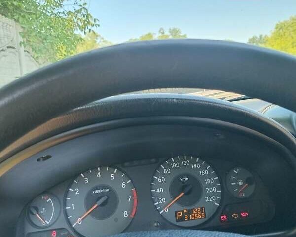 Синий Ниссан Альмера, объемом двигателя 1.6 л и пробегом 310 тыс. км за 3300 $, фото 3 на Automoto.ua