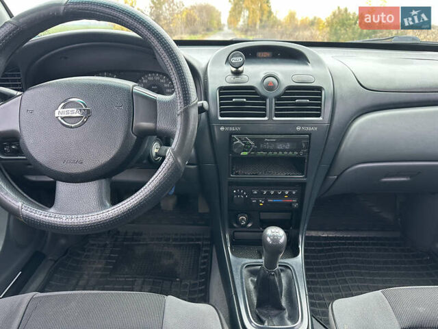 Синий Ниссан Альмера, объемом двигателя 1.6 л и пробегом 236 тыс. км за 5000 $, фото 23 на Automoto.ua