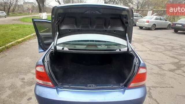 Синий Ниссан Альмера, объемом двигателя 1.6 л и пробегом 280 тыс. км за 3400 $, фото 10 на Automoto.ua