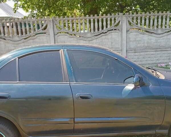 Синий Ниссан Альмера, объемом двигателя 1.6 л и пробегом 310 тыс. км за 3300 $, фото 9 на Automoto.ua